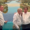 Henry King baptizes his father, Wesley, with son Gary in the baptistry with them. Wesley King is 88 years old.